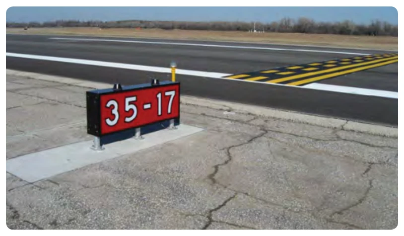 Runway holding position sign and marking for LAHSO.