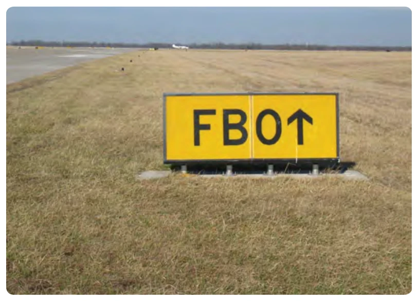 Destination sign to the fixed-base operator (FBO).