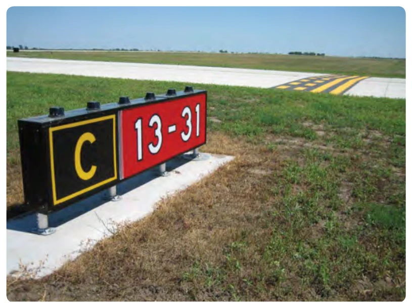 Runway 13-31 holding position sign and marking located on Taxiway Charlie.